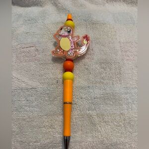 Orange Charmander Pen with Beads. NWT